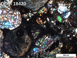 Thin Section Photo of Sample DOM 18420 in Cross-Polarized Light with 5X Magnification