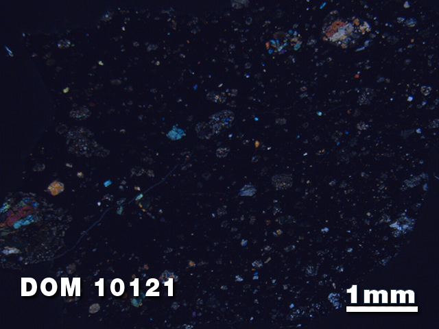 Thin Section Photo of Sample DOM 10121 at 1.25X Magnification in Cross-Polarized Light