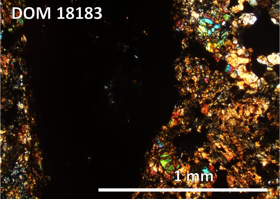 Thin Section Photo of Sample DOM 18183,2 at 5x magnification in Cross Polarized Light