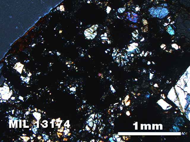 Thin Section Photo of Sample MIL 13174 in Cross-Polarized Light with 2.5X Magnification