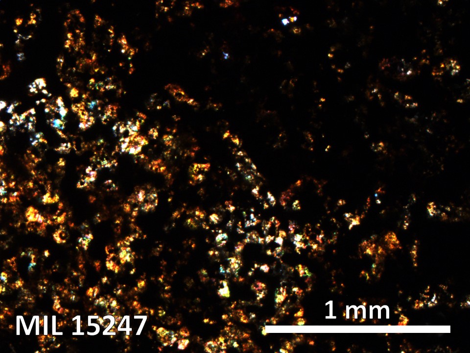Thin Section Photo of Sample MIL 15247 in Cross-Polarized Light with 5X Magnification