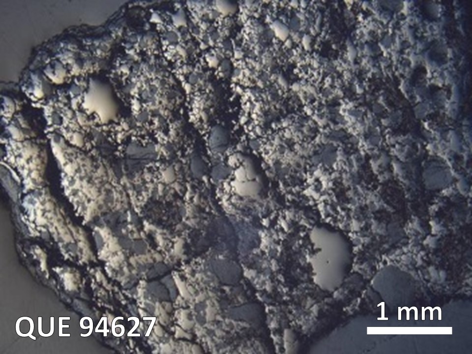 Thin Section Photo of Sample QUE 94627 in Reflected Light with  Magnification