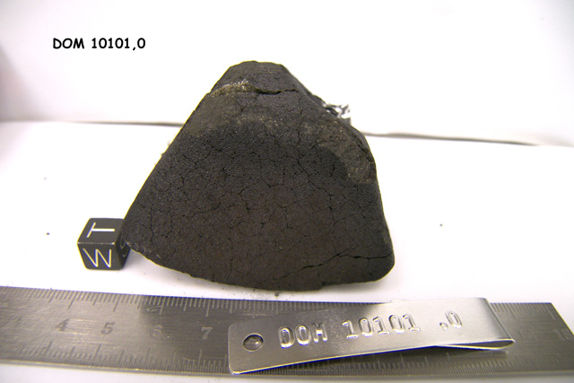 Lab Photo of Sample DOM 10101 Displaying West Orientation.