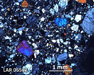 LAR 06512 Meteorite Thin Section Photo with 2.5x magnification in Cross-Polarized Light
