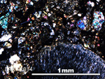 Thin Section Photo of Sample LAR 12034 in Cross-Polarized Light with 5X Magnification