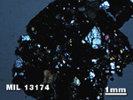 Thin Section Photo of Sample MIL 13174 in Cross-Polarized Light with 1.25X Magnification