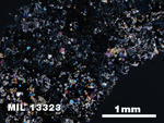 Thin Section Photo of Sample MIL 13323 in Cross-Polarized Light with 2.5X Magnification