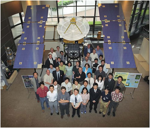 Full-scale replica of the Hayabusa Spacecraft, with the mission Science Team